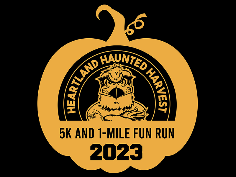 An image of a pumpkin with the words Heartland Harvest 5K and 1 mile fun run 2023